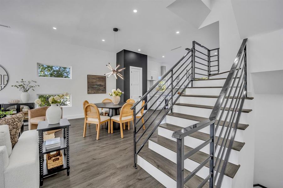 Stairway with hardwood / wood-style flooring