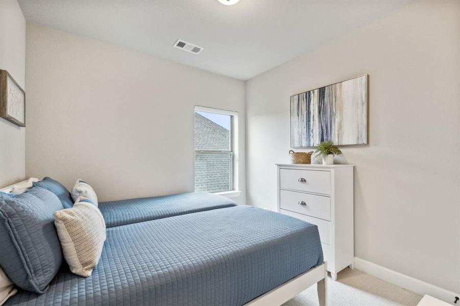 Bedroom featuring carpet