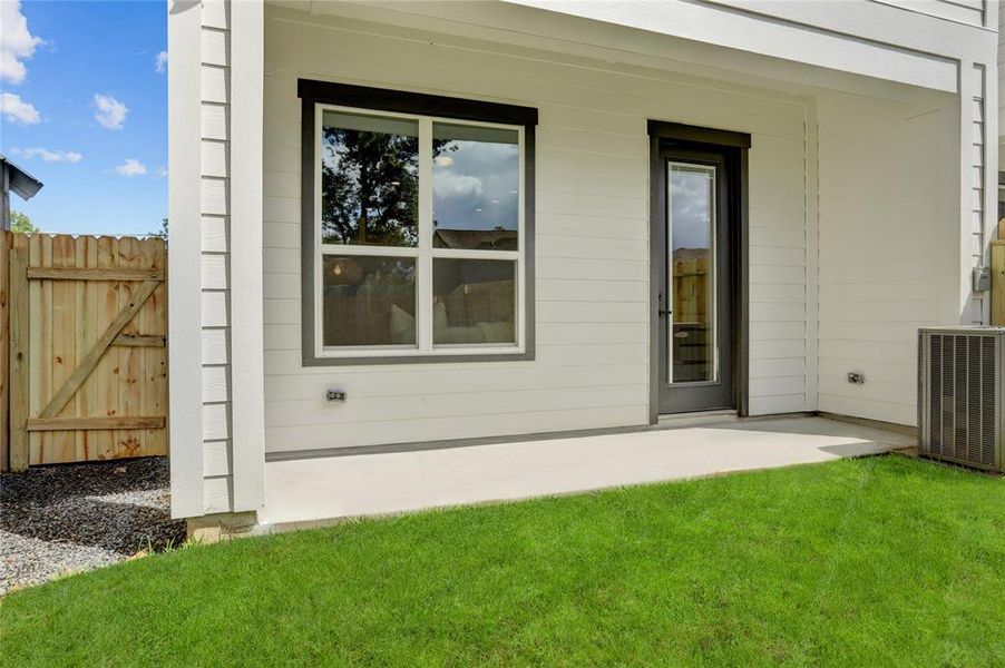 The home has a covered back patio.