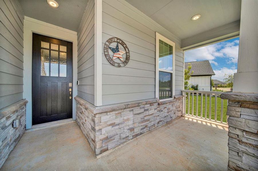 Enjoy the breeze on your inviting covered front porch!