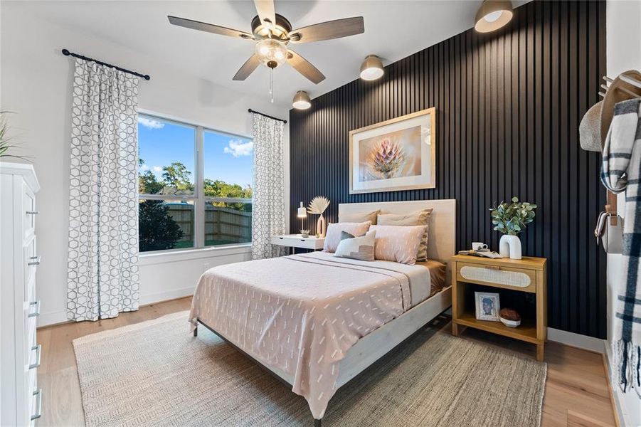 Bedroom 4 with Walk-in Closet, Engineered Hardwood Flooring, and Custom Wall Design