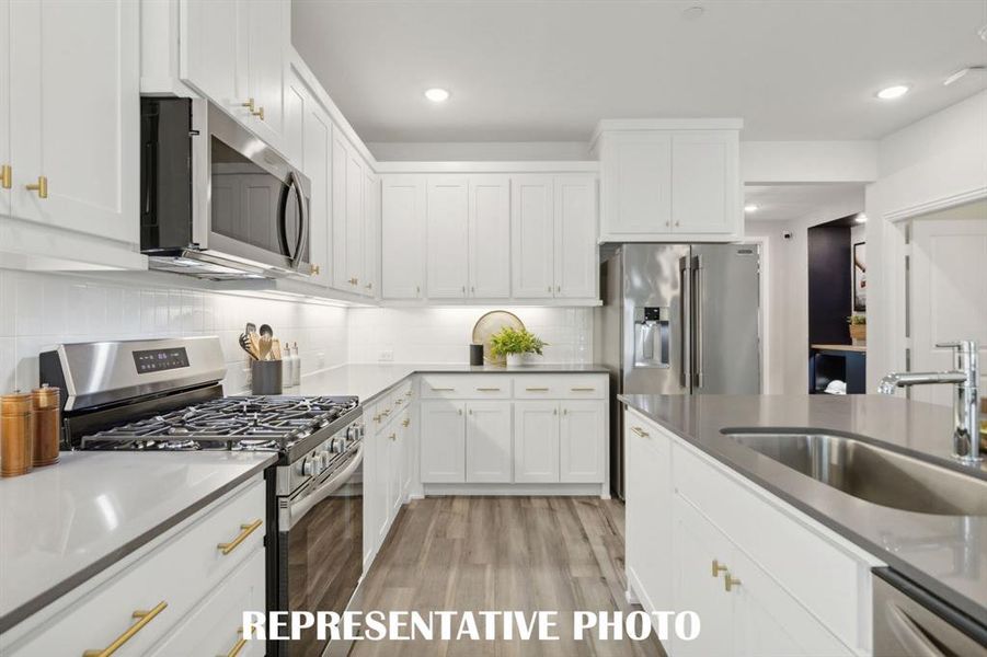 Beautifully designed kitchens filled with space and style are everywhere you look in Twin Creeks Watters!  REPRESENTATIVE PHOTO