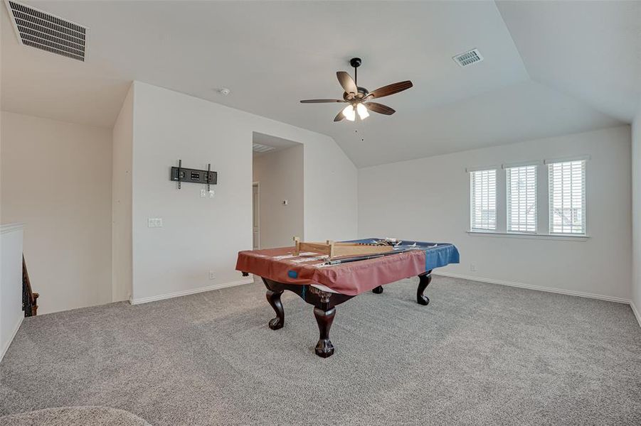 Playroom with carpet flooring, vaulted ceiling, billiards, and ceiling fan