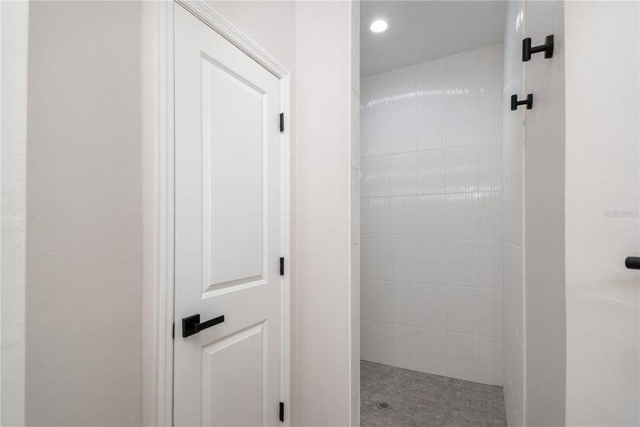 Primary Bathroom with Large Walk-In Shower, Linen Closet