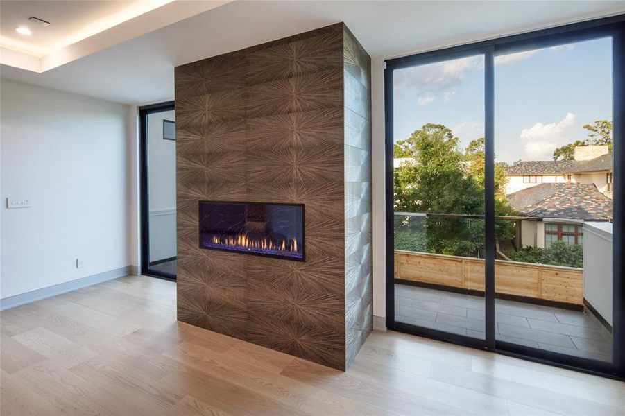 Exquisite porcelain tile surrounding the primary fire place