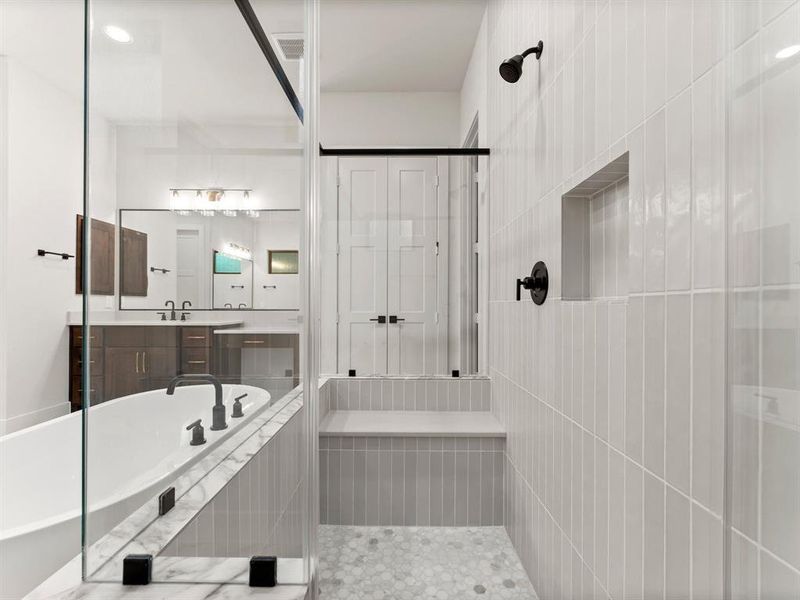 Built-in Bench and Shampoo Shelf at Primary Bathroom Shower