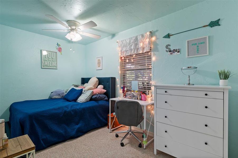 Bedroom with carpet floors and ceiling fan