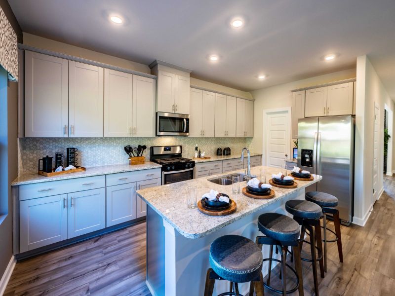 Kitchen in the Dakota floorplan at a Meritage Homes community in Spartanburg, SC.