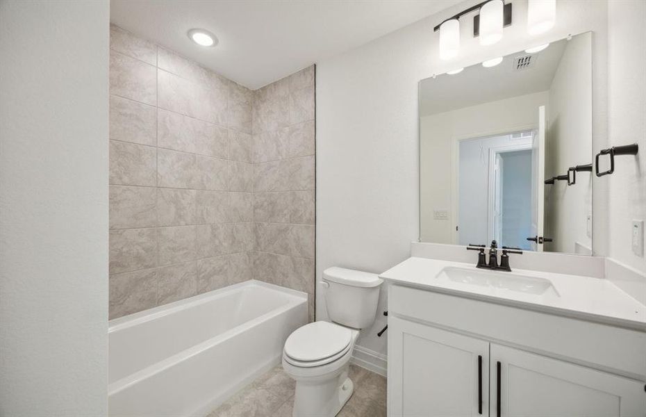 Spacious secondary bathroom *real home pictured