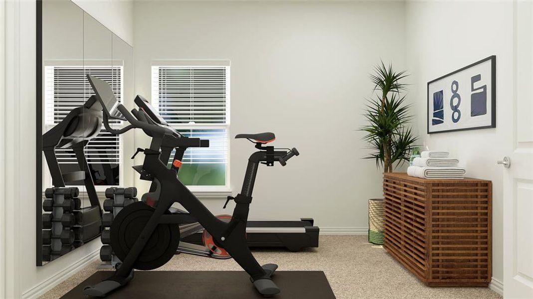 Exercise room with light colored carpet