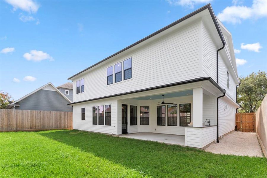 Spacious Back yard w/ plenty of green space.