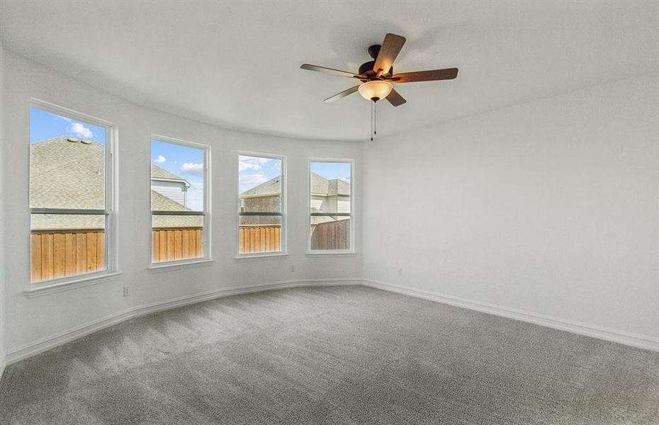 Elegant owner's suite with Bay window *real home pictured