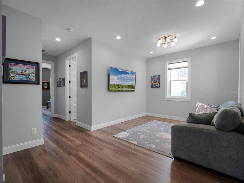 All 3 oversized bedrooms flow into this bonus room area.