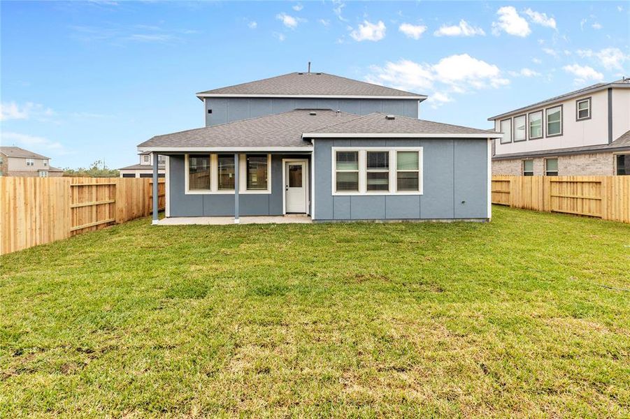 This home truly offers the best in modern living with covered patio and large fenced backyard.