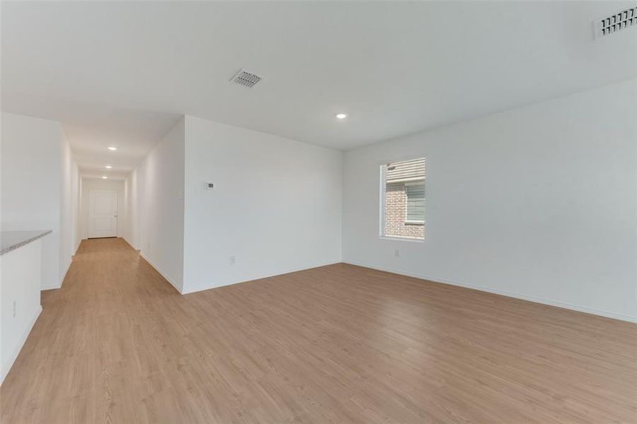 Spare room featuring light hardwood / wood-style floors