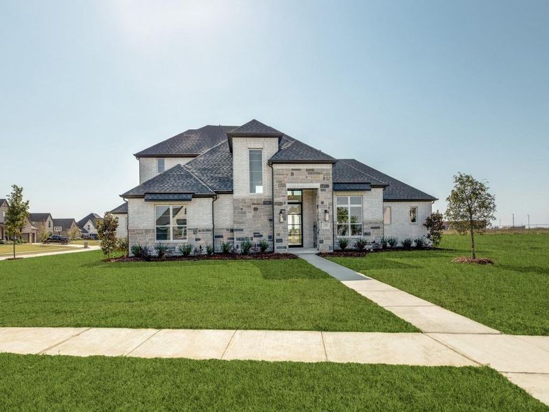 View of front of home featuring a front lawn