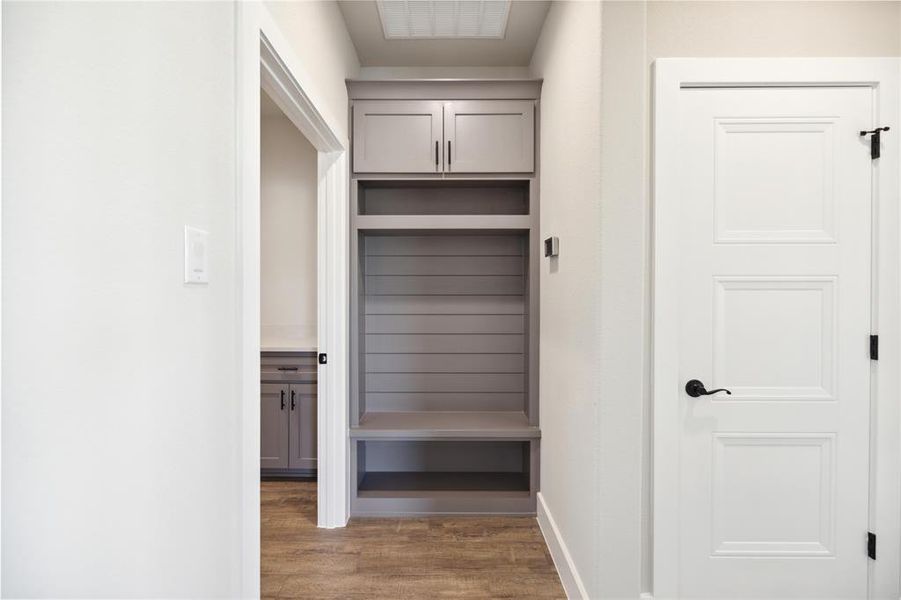 Mudroom featuring dark hardwood / wood-style floors