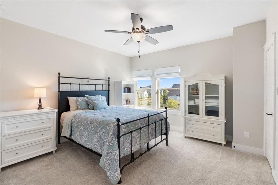 Just at the top of the stairs you will find this large guest room with a walk-in closet and ensuite bathroom. *Queen size bed and still plenty of room.