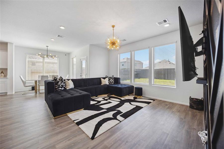 Family room with windows off of kitchen