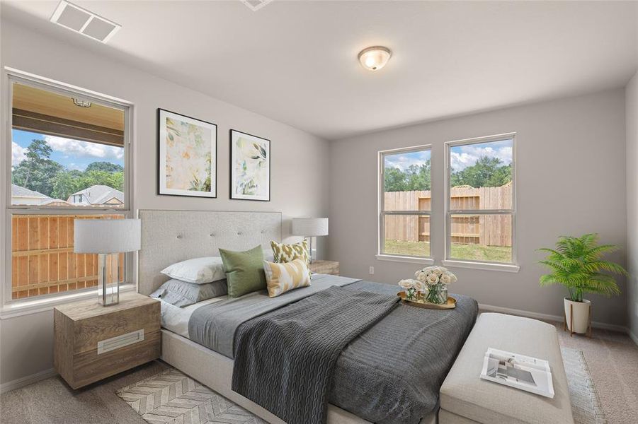 The primary bedroom is generously sized, creating a tranquil and spacious retreat that offers ample room for relaxation. Featuring plush carpet, high ceilings, fresh paint, and large windows that lets in natural lighting throughout the day.