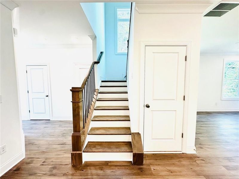 Adding a massive window in the stairwell opens the space up and even has a view while ascending onto the 2nd floor.