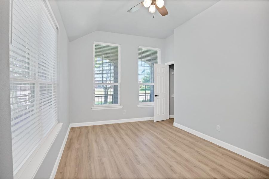 Office/Flex Room with closet that overlooks the front porch.