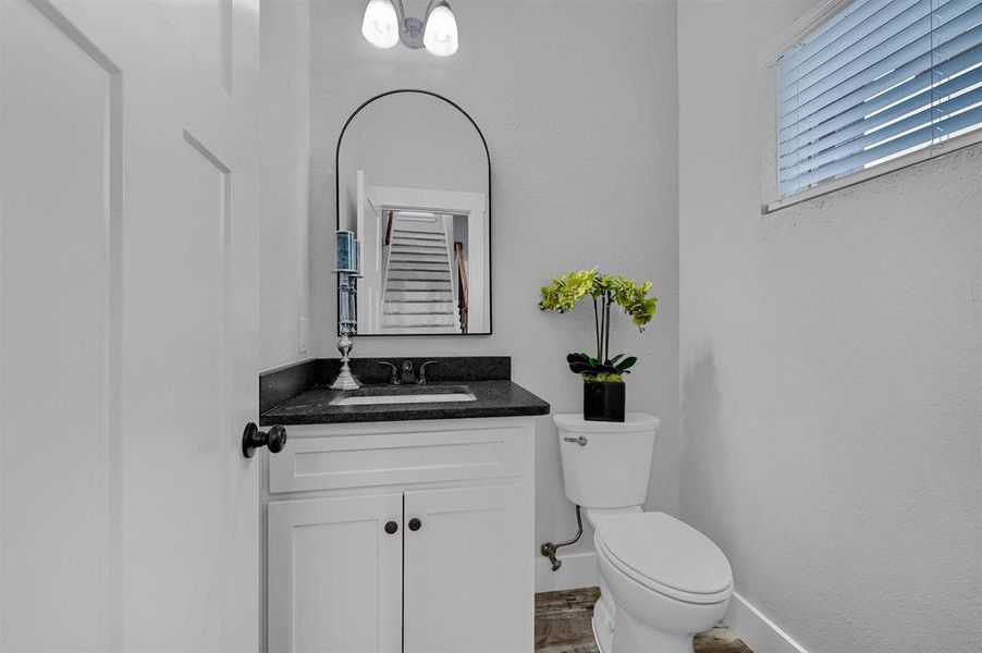 Bathroom with vanity and toilet