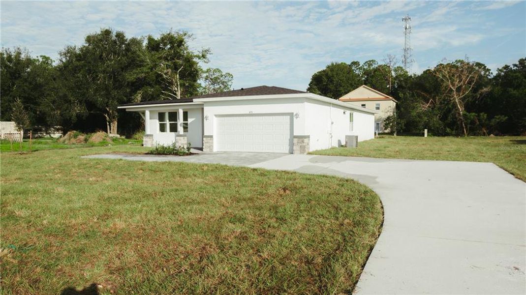 Home pictured is model home. Not subject.