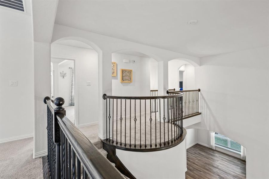 Hallway featuring dark wood-type flooring