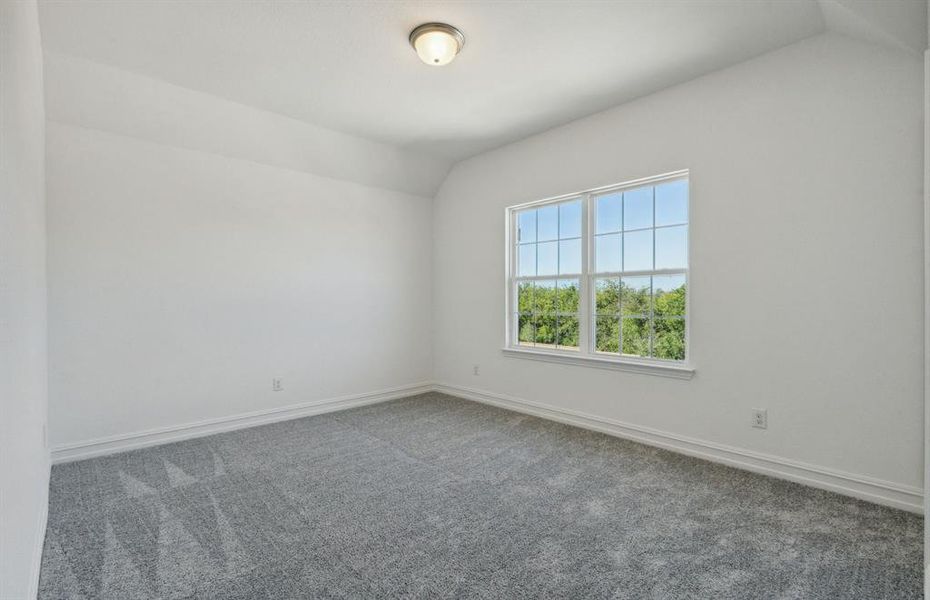 Spacious secondary bedroom with ample closet space *real home pictured