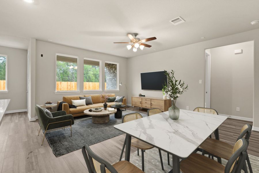 Family & Dining room. Note: Sample product photo - actual exterior and interior selections may vary by homesite