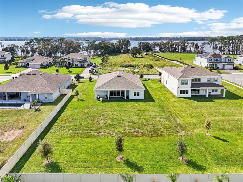 The COVERED PAVER LANAI and expansive backyard give you the perfect canvas to imagine and create the outdoor space of your dreams and you have VIEWS OF LAKE PICKETT from the front.