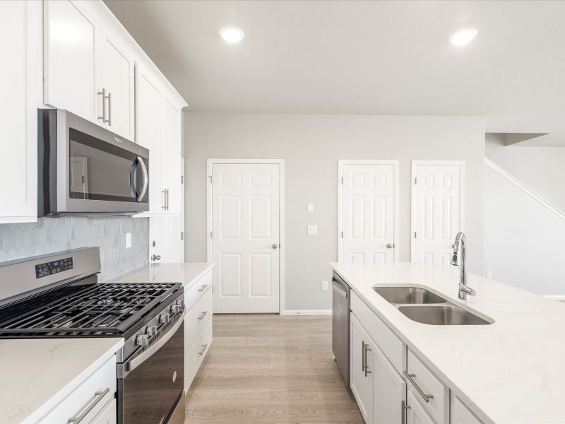 The Woodland floorplan interior image taken at a Meritage Homes community In Aurora, CO.