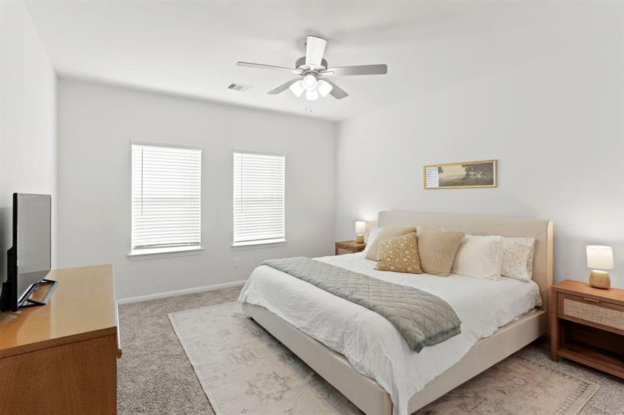 Totally tranquil, this spacious master bedroom offers a peaceful retreat.