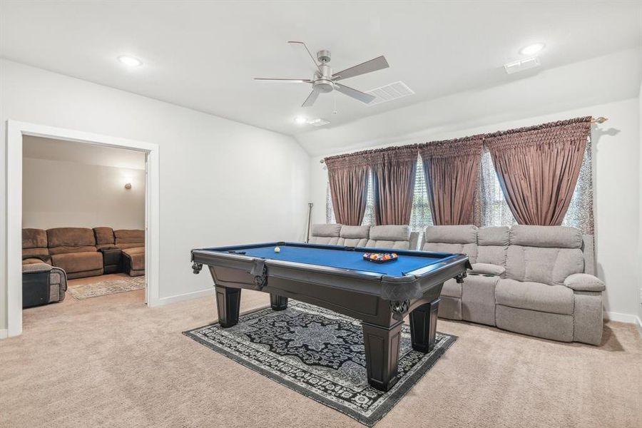 Game room featuring light carpet, billiards, and ceiling fan