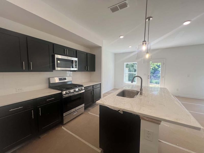 Kitchen featuring the Industrial Collection Finishes Construction Progress