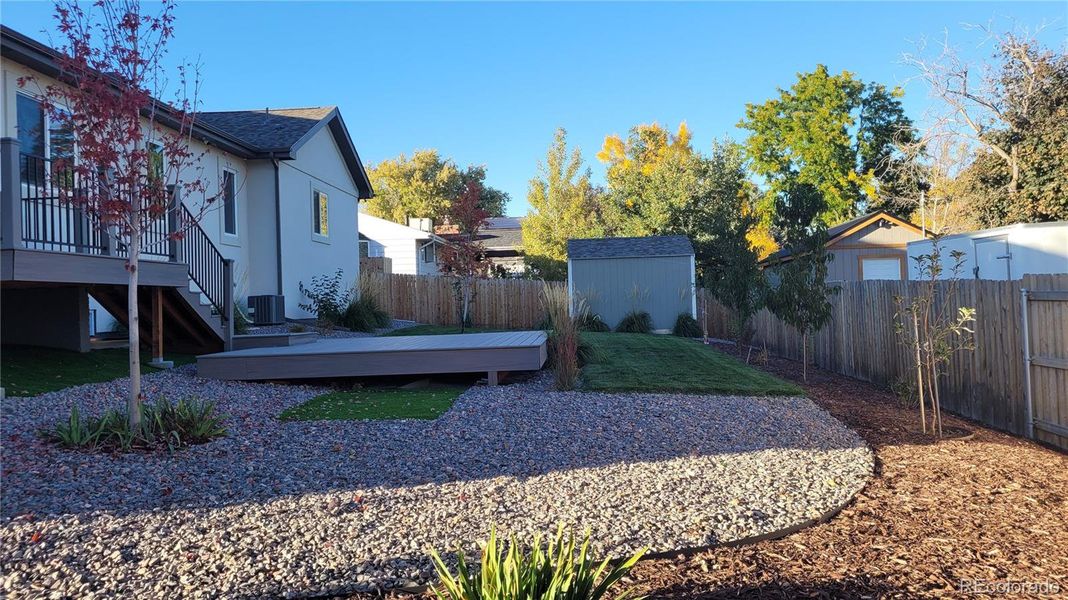 Fully landscaped with partial xeriscaping with sprinkler and drip system
