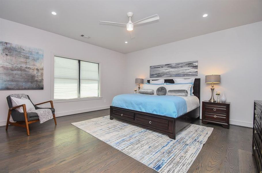 Roomy primary bedroom can handle your oversized furniture; plenty of natural light as well.