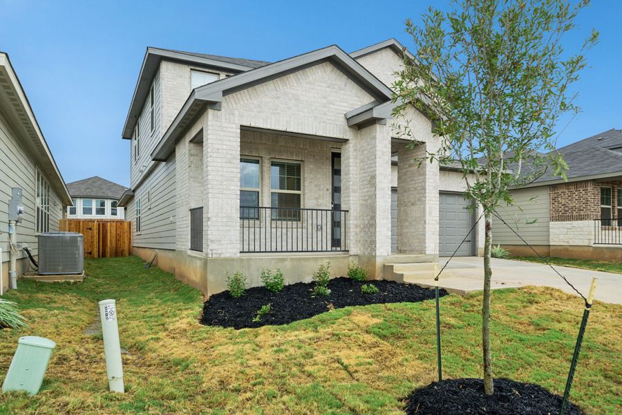 Front exterior of the Reynolds floorplan at a Meritage Homes community.