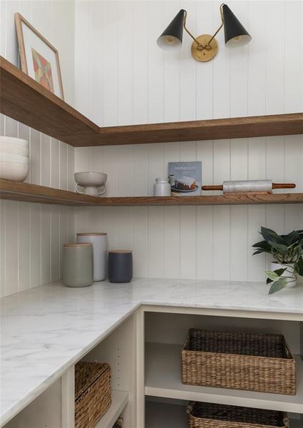 walk-in pantry behind hidden door.