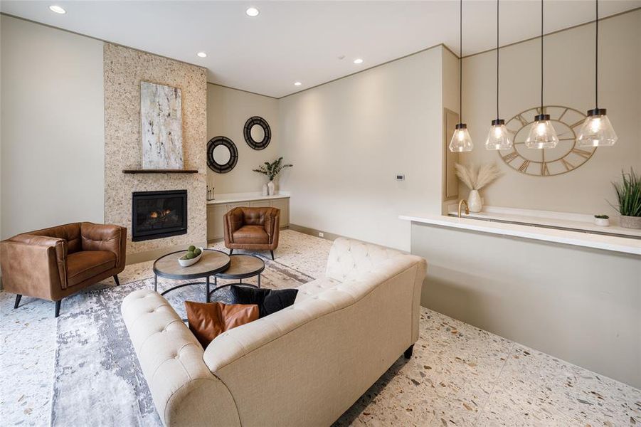 Alternate view of the Four Seasons room. Modern fire place with surround and Terrazzo tile specially imported from Italy