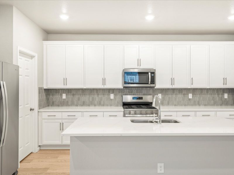 The Vail floorplan interior image taken at a Meritage Homes community in Northern Colorado.