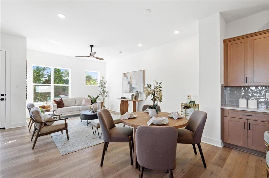 Kitchen and dining area open to the living room.