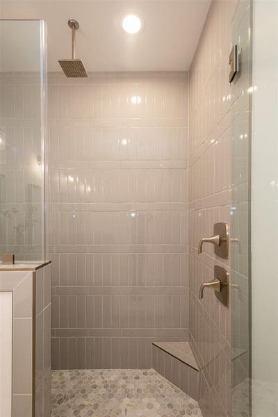 Bathroom with a tile shower