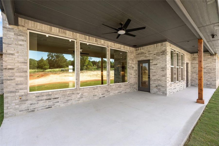 Plenty of room on the covered back patio for entertaining.