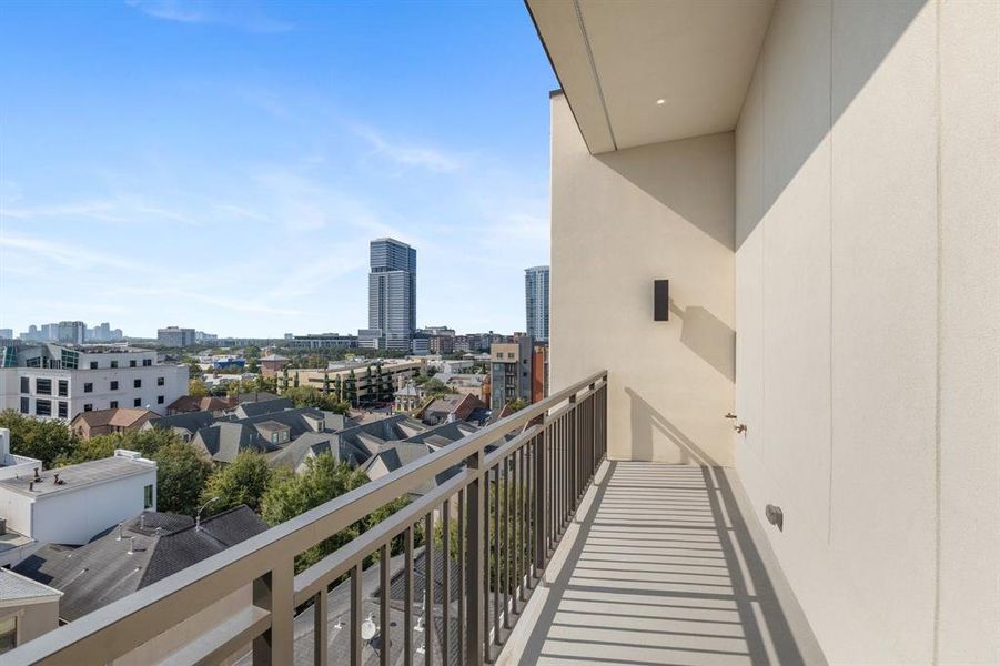 Partial view of covered balcony accessed from living room, spans 157 square feet total. Balcony views are to the west, towards The Galleria and surrounding areas.