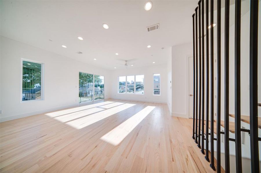 Unfurnished living room with light hardwood / wood-style flooring