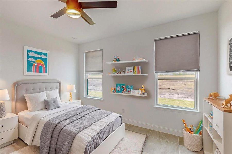 Bedroom featuring light tile patterned floors and ceiling fan