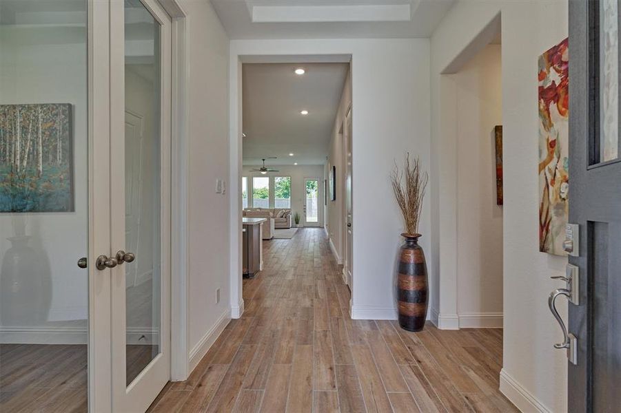 As you step inside this you’ll love the wood looking tiled floors throughout the home.