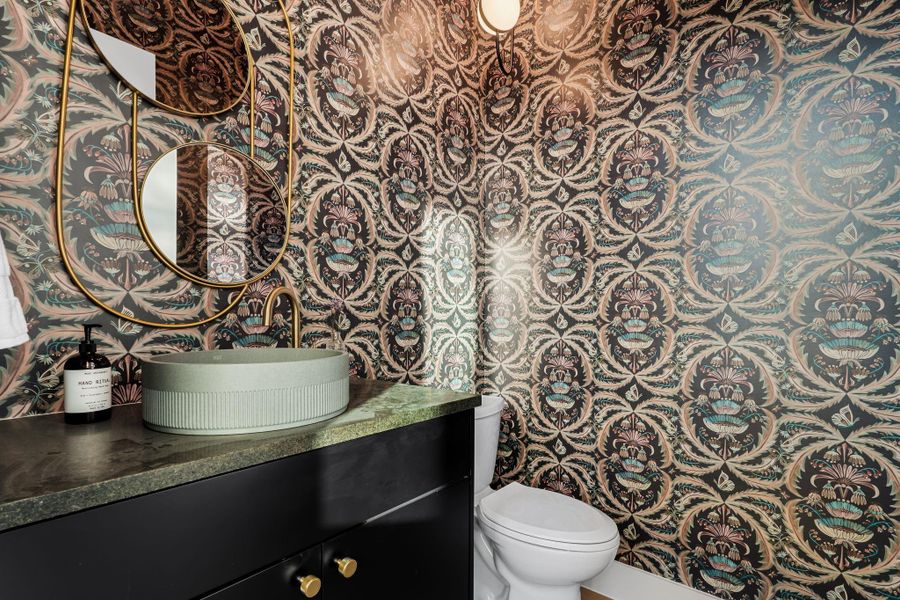 Powder bath on main with custom wall paper